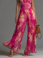 Leila| Plisserad Blommig Jumpsuit i Fuchsia™
